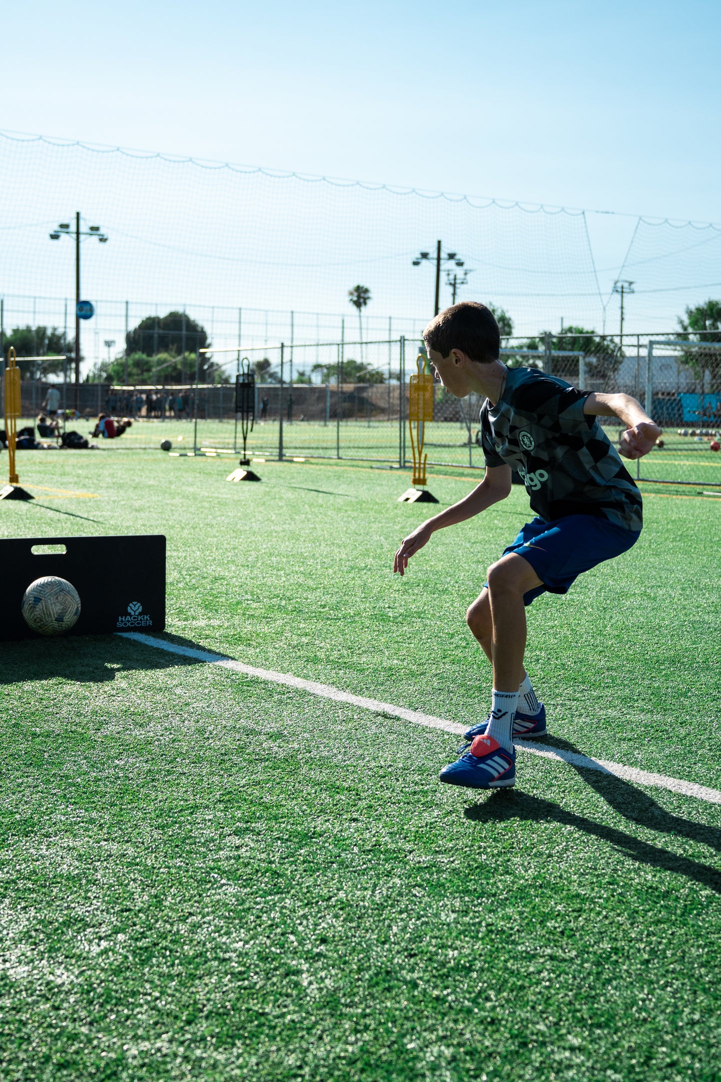 Soccer training rebounder setup in use passing and receiving drills